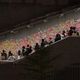 Pro-democracy demonstrators add a post-it note message of support to the “Lennon Wall” at the protest camp near government headquarters.